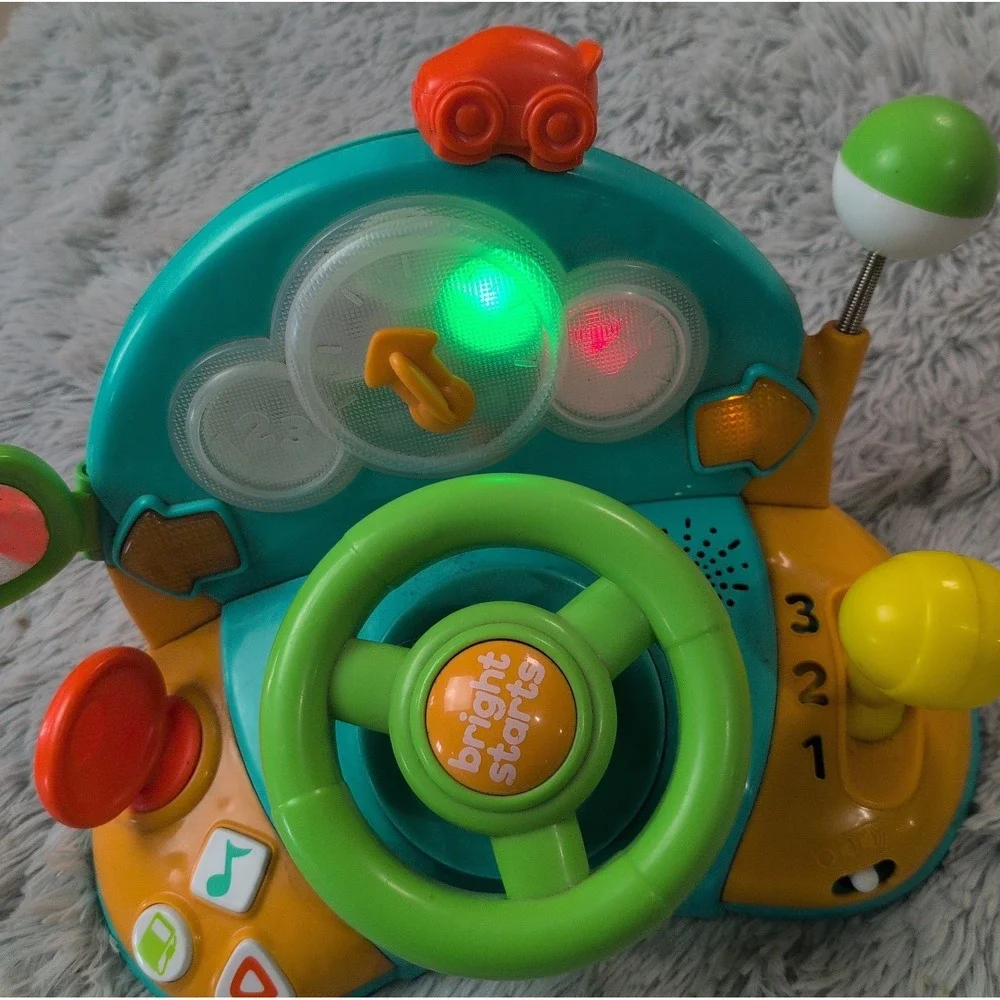 Bright Starts Lights & Colors Driver Light-Up Musical Baby Activity Toy Works